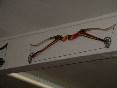 One of the early model compound bows mounted on the warehouse wall